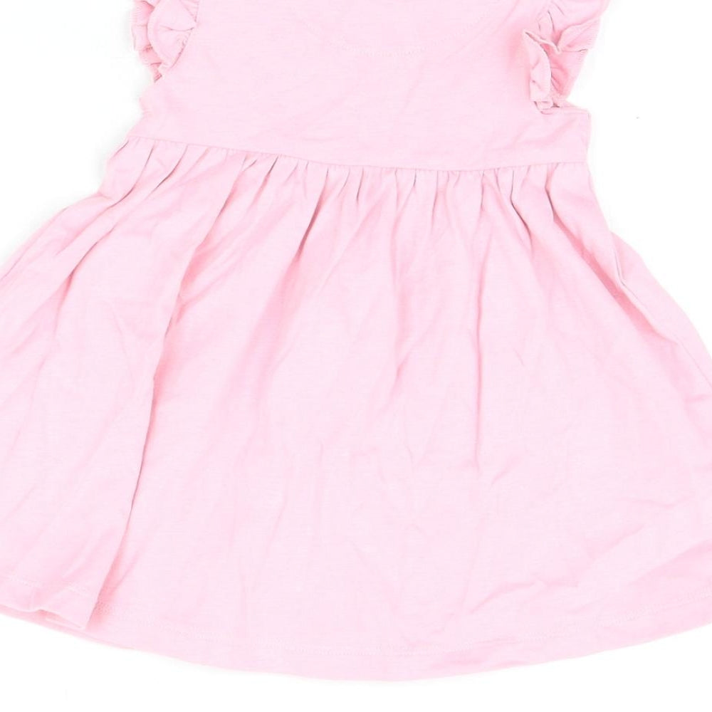 Brand and care label for Marks & Spencer girls’ pink cotton a-line, size 3-6, months round neck snap