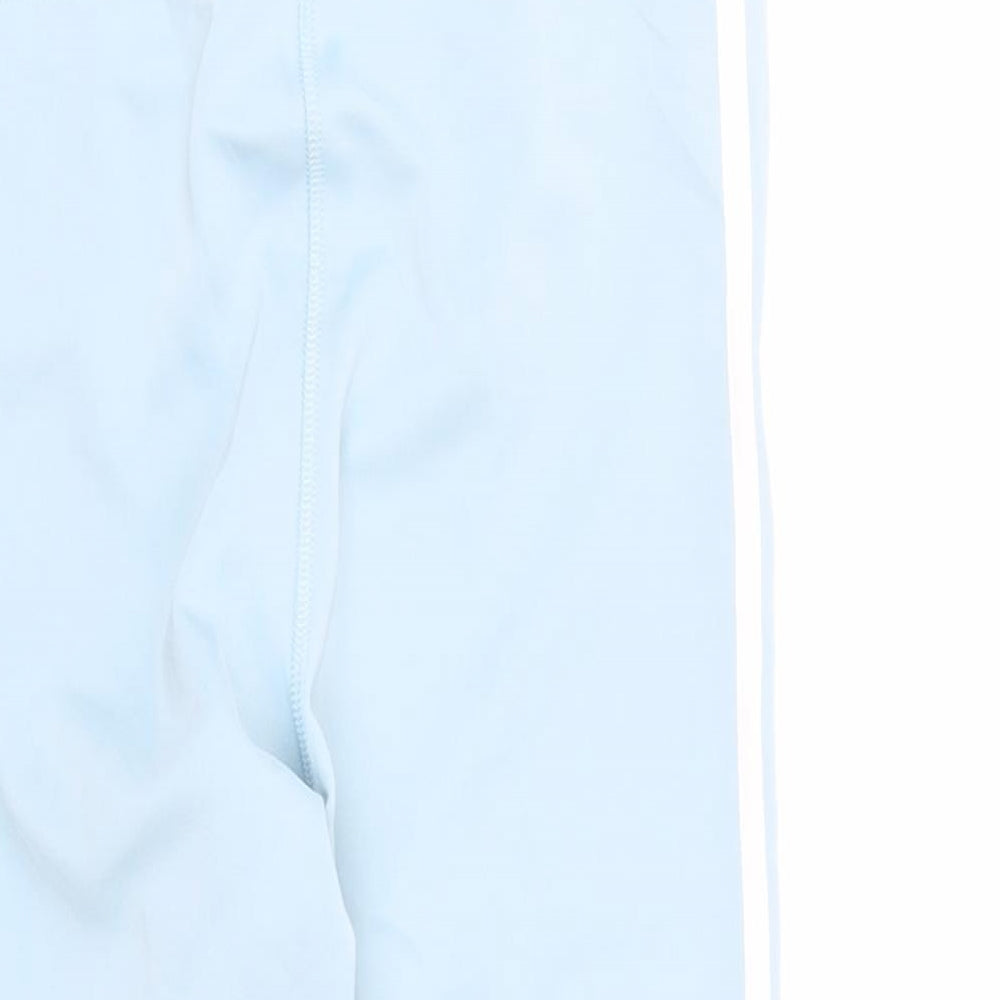 Brand and care label for adid women’s blue polyester capri leggings, size S, 20-inch leg regular