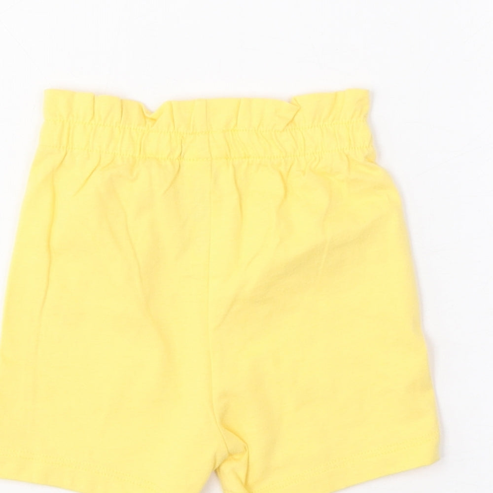 Brand and care label for Marks & Spencer girls’ yellow cotton cropped trousers, size 6-9, months pullover - lemon