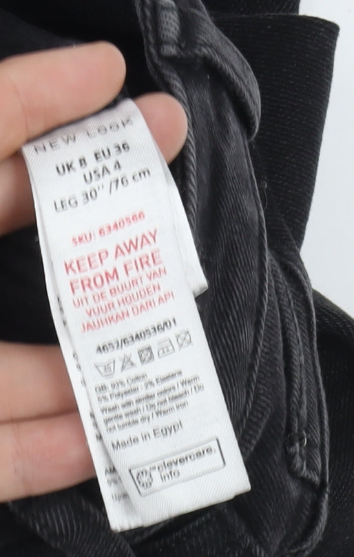 Brand and care label for New Look Black Distressed Skinny Jeans, size 8