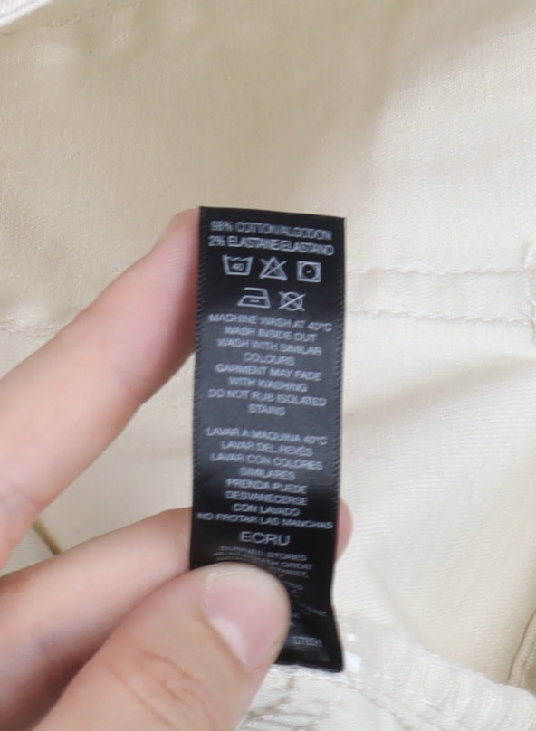 Brand and care label for Dunnes Women's Ivory Straight Jeans, size 8