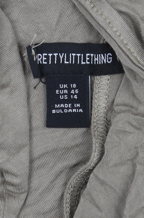 Brand and care label for PRETTYLITTLETHING Beige Halter Maxi Dress, size 18
