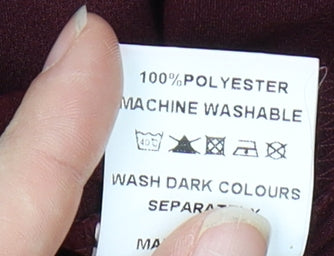 Brand and care label for Missguided Women's Red Wrap Blouse, size 16, Casual Style