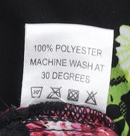 Brand and care label for Dancing Leopard Black Floral Shift Dress L