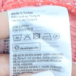 Brand and care label for H&M Red Floral Cropped Blouse with Puff Sleeves