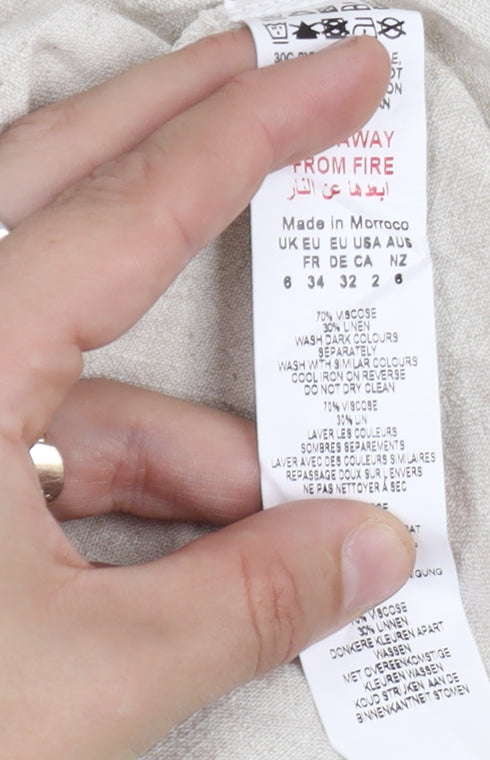 Brand and care label for PRETTYLITTLETHING White Slip Dress -, size 6
