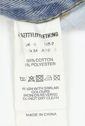 Brand and care label for PRETTYLITTLETHING Blue Petite Distressed Jeans - XS