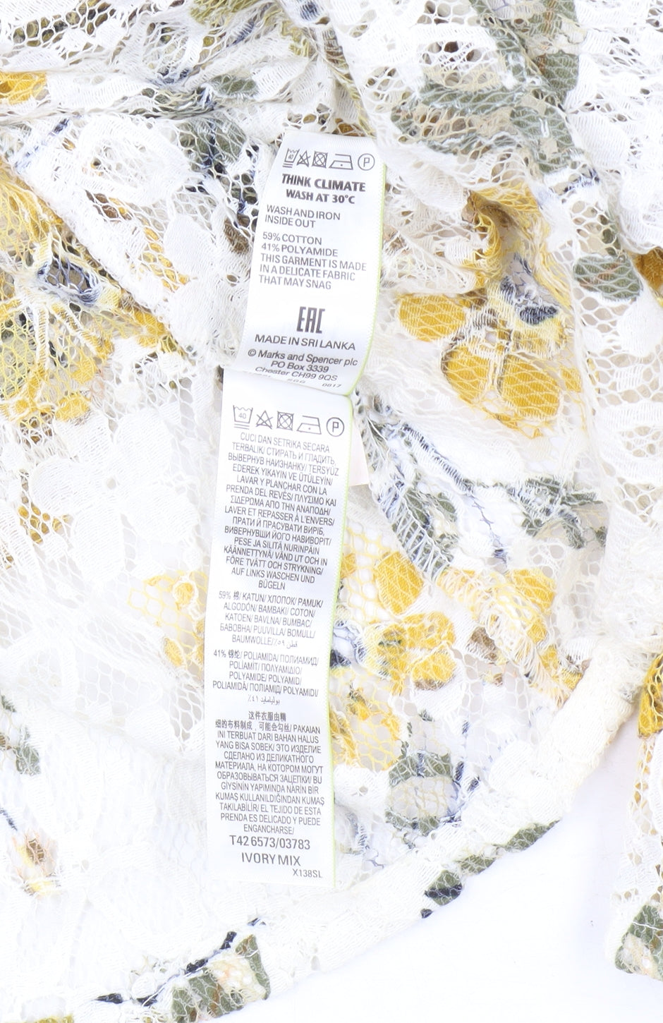 Brand and care label for Marks & Spencer Floral Lace Dress, size 14, Ivory