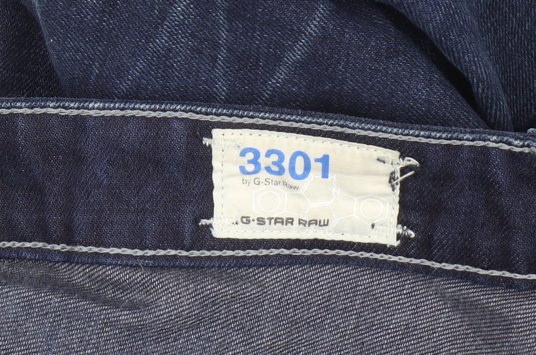 Brand and care label for G-Star Men's Blue Tapered Jeans, size 32