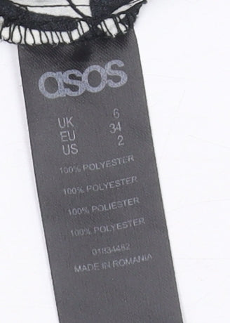 Brand and care label for ASOS Women's Black & White Geometric Joggers, size 6