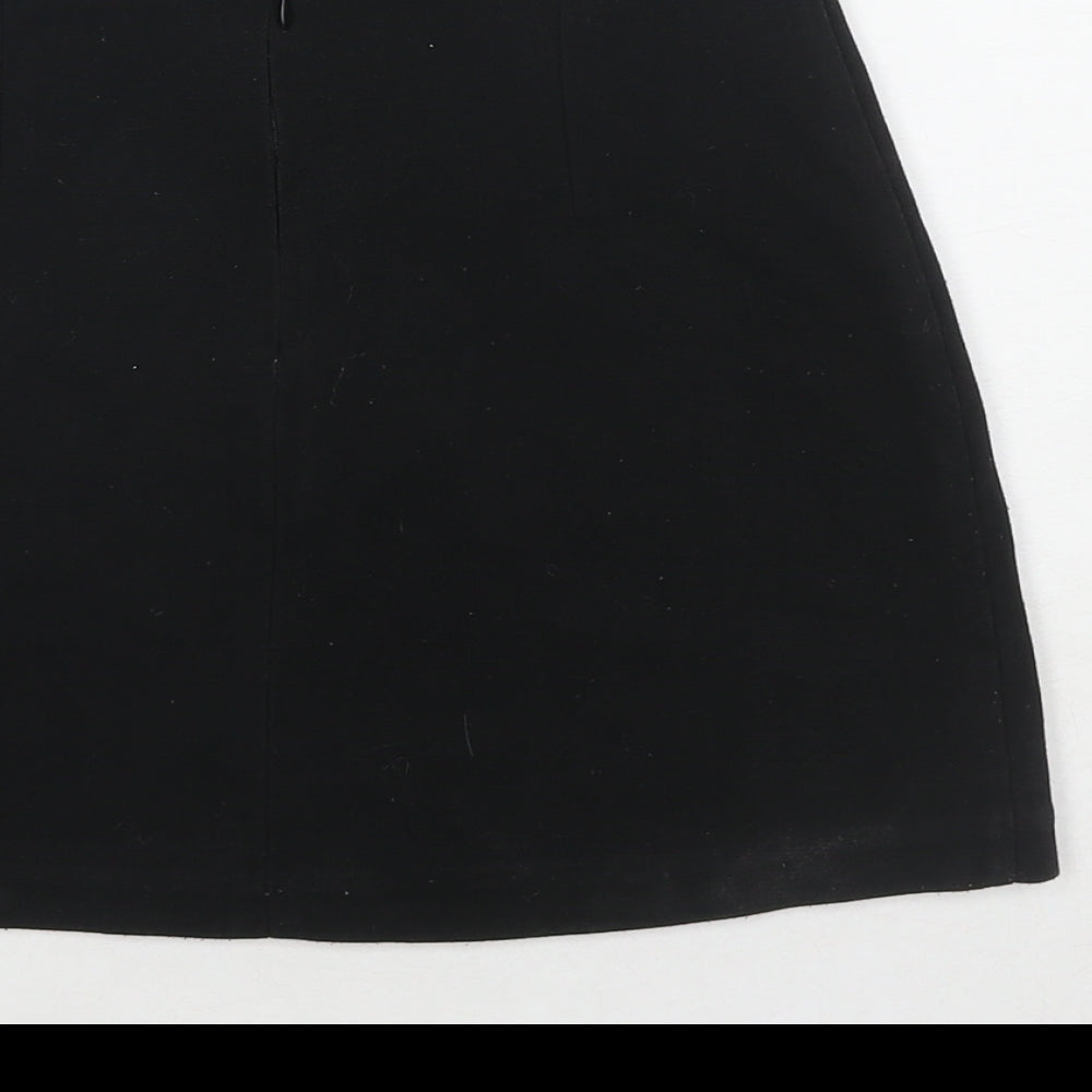 Brand and care label for Cooperative women’s black polyester a-line skirt, size XS, zip