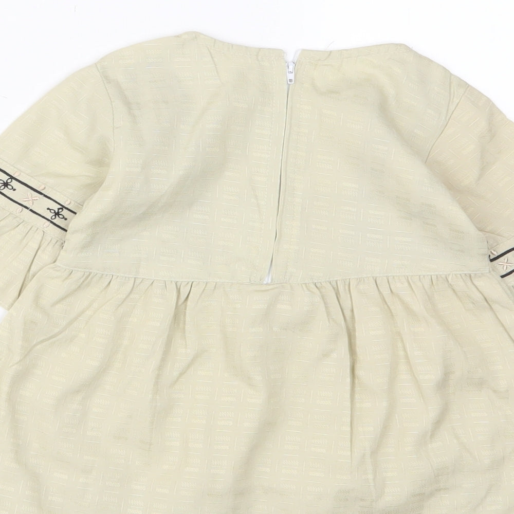 Brand and care label for Attitude girls’ beige fair isle cotton a-line, size 18, months crew neck zip - embroidered