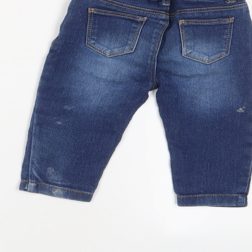 Brand and care label for Denim & Co. boys’ blue cotton capri jeans, size 6-9, months button