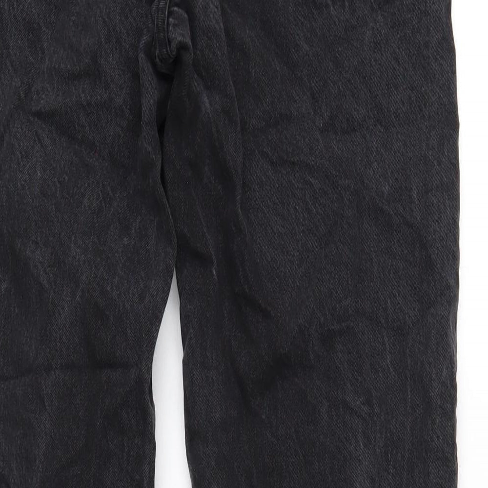 Brand and care label for ASOS women’s black cotton straight jeans, size UK 28, in, 32-inch leg regular button
