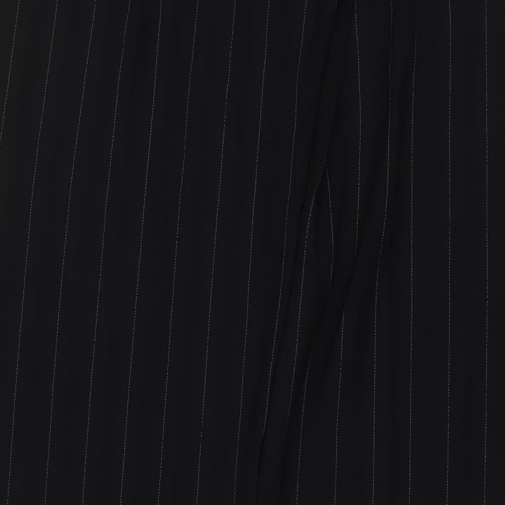 Brand and care label for AMARANTO women’s black striped polyester trousers, size UK 10, 31-inch leg regular