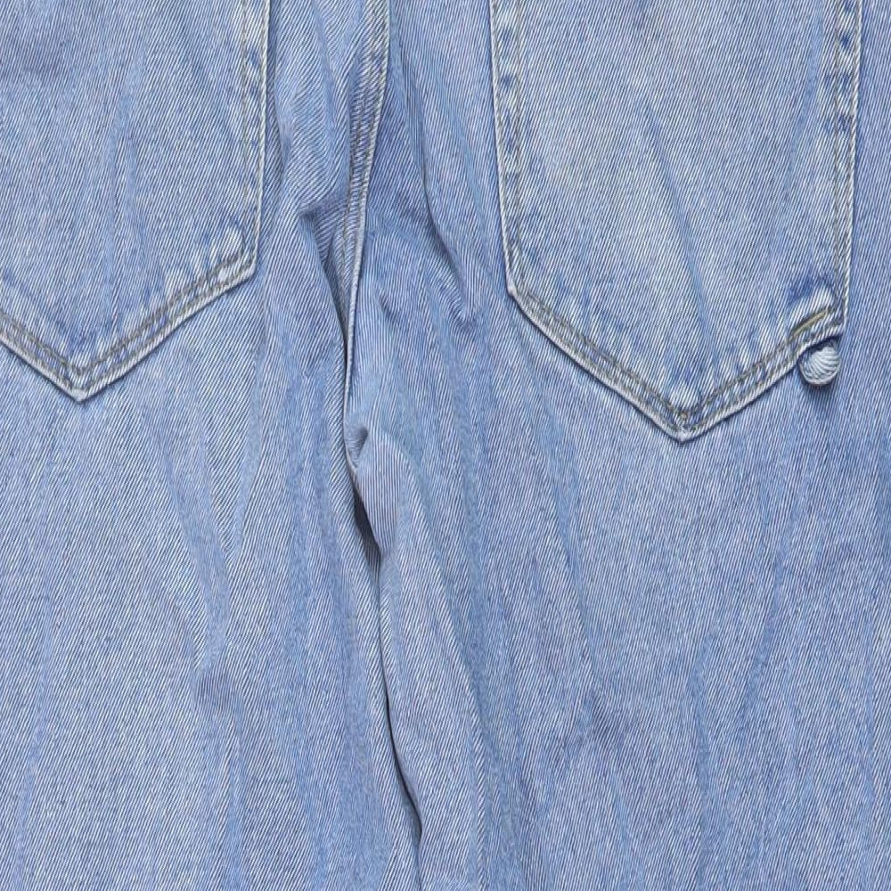 Brand and care label for ASOS women’s blue cotton straight jeans, size UK 32, in, 27-inch leg regular button