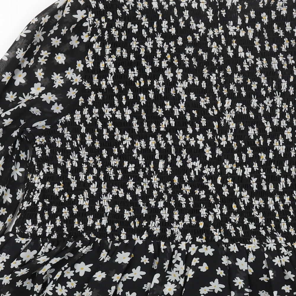 Brand and care label for ASOS women’s black floral polyester a-line, size UK 8, round neck zip - rouched bodice
