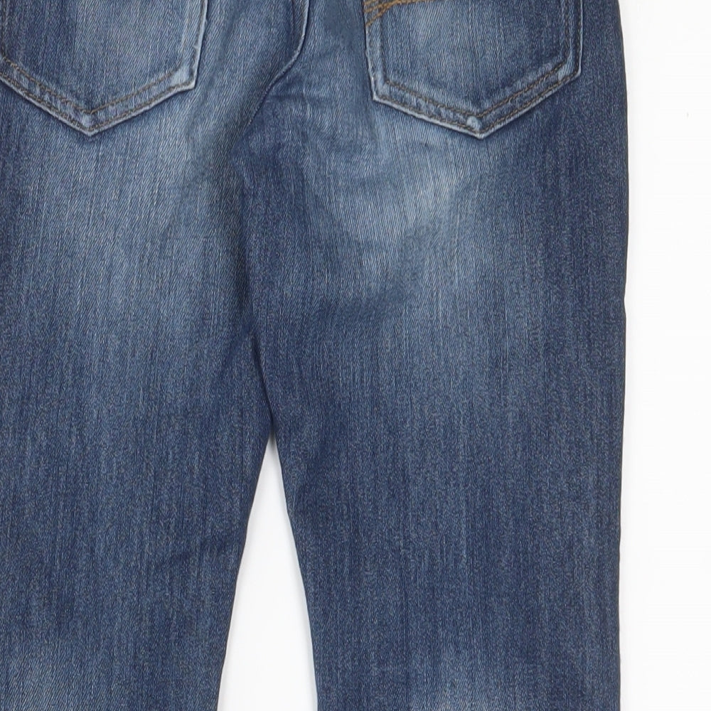 Brand and care label for Next boys’ blue cotton straight jeans, size 9, months, 23-inch leg regular zip - adjustable waist