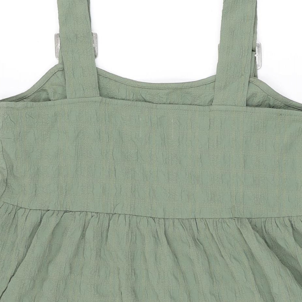 Brand and care label for ASOS women’s green polyester mini, size UK 8, square neck buckle