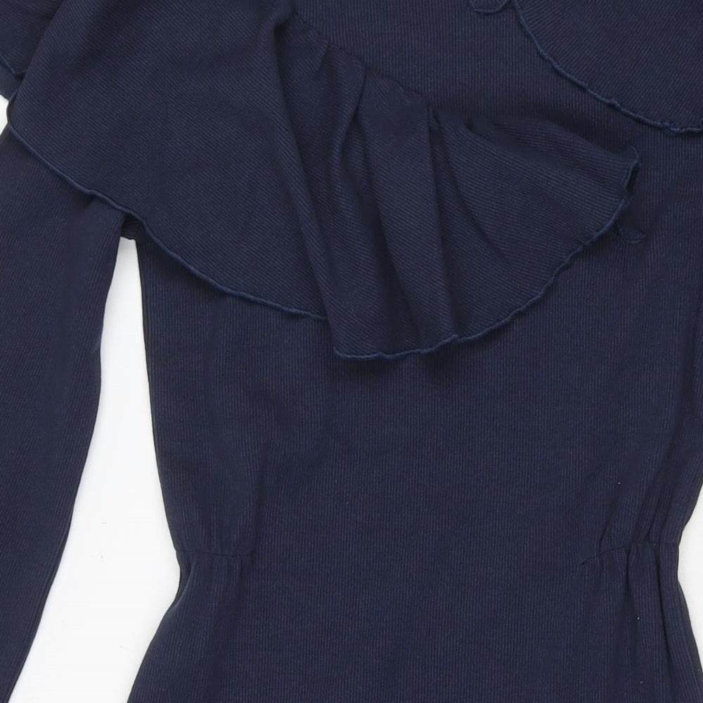 Brand and care label for Eren Vintage women’s blue cotton fit & flare, size XS, round neck pullover