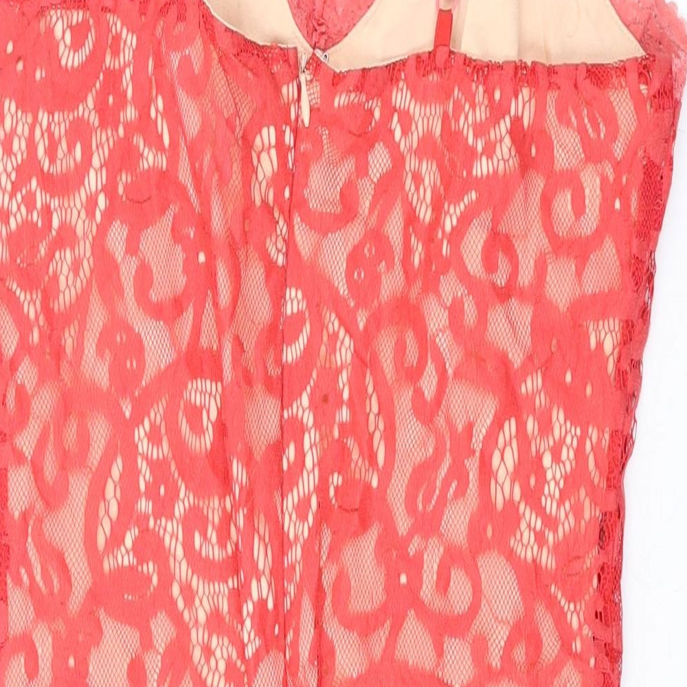 Brand and care label for Missguided women’s pink geometric polyester mini, size UK 12, v-neck zip