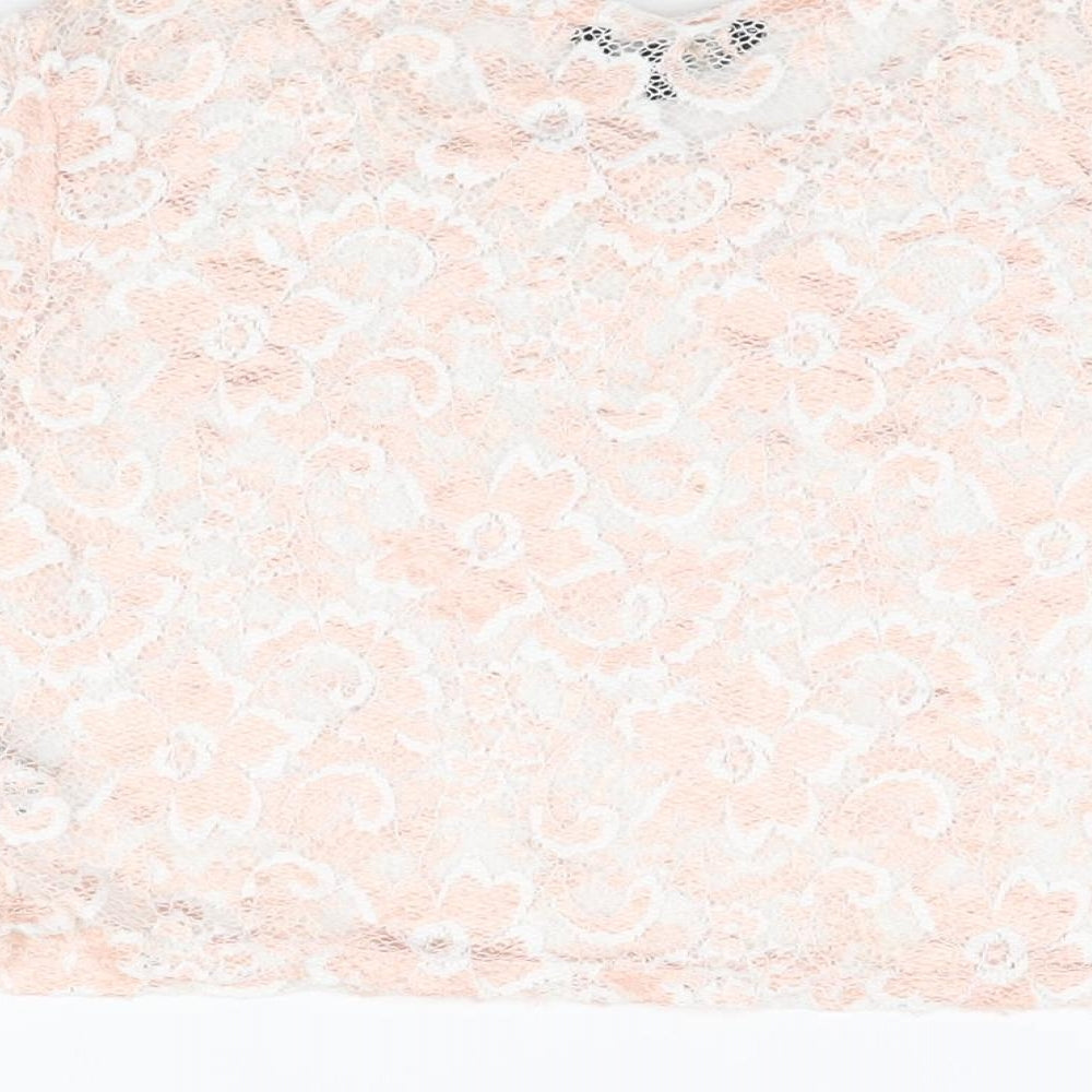 Brand and care label for Candy Couture girls’ pink floral polyester cropped t-shirt, size 15, years round neck pullover
