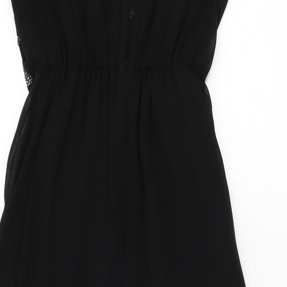 Brand and care label for Miss Selfridge women’s black polyester maxi, size UK 6, round neck button