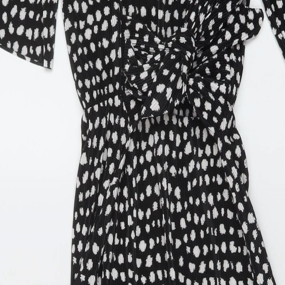 Brand and care label for ASOS women’s black geometric polyester a-line, size UK 8, round neck button