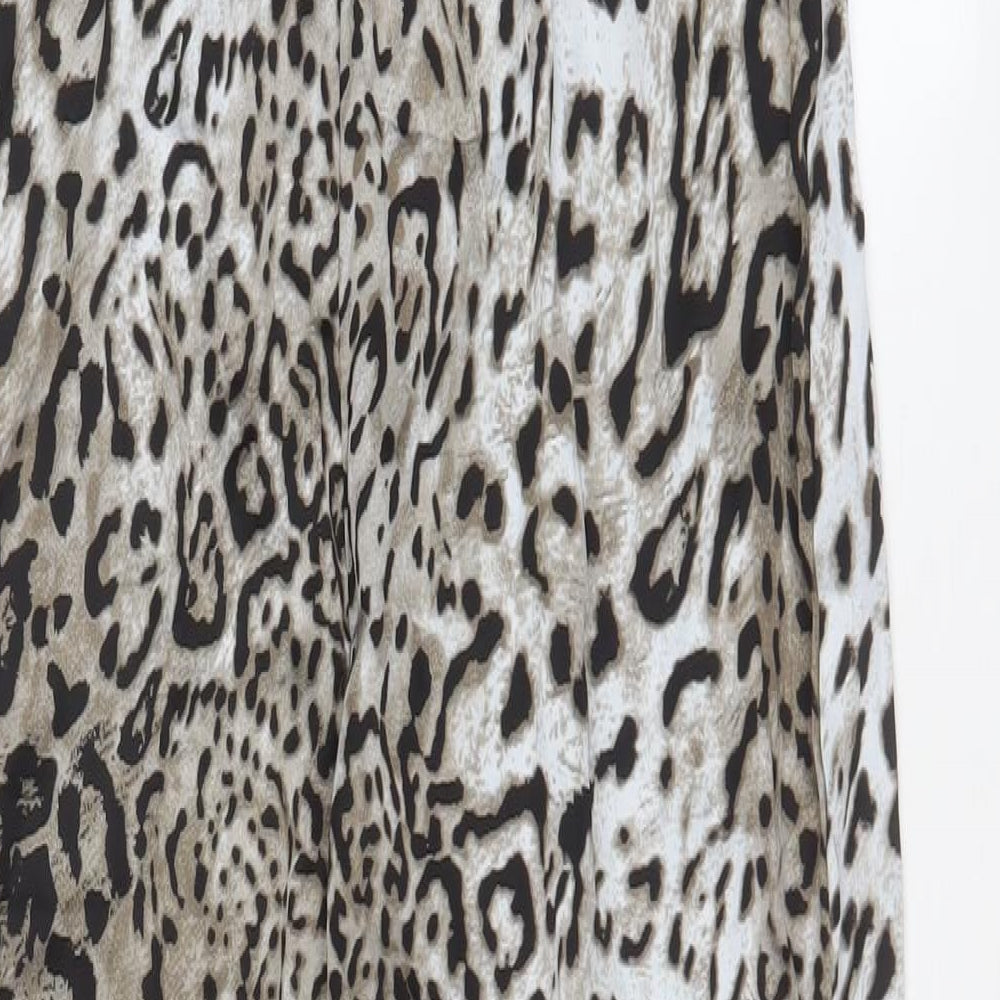 Brand and care label for Missguided women’s grey animal print polyester a-line, size UK 12, cowl neck zip