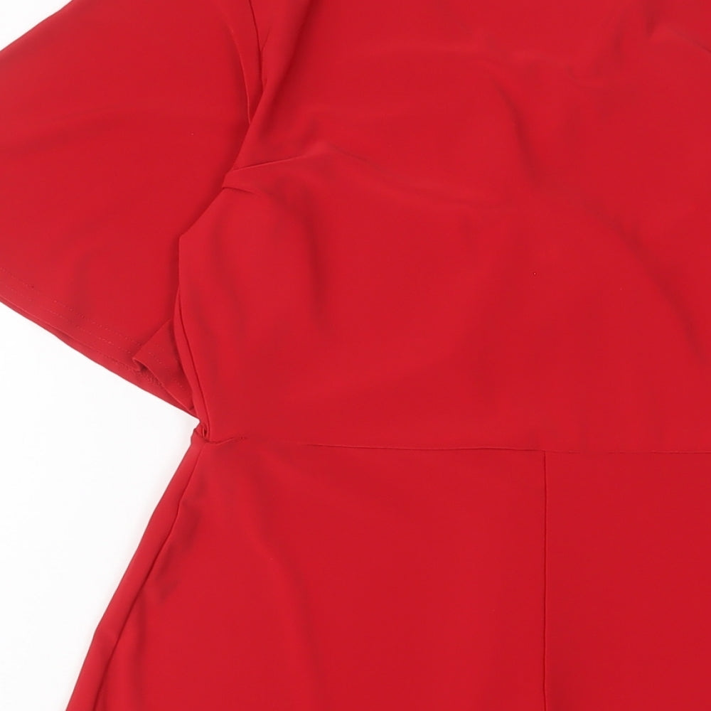 Brand and care label for Missguided women’s red polyester playsuit one-piece, size UK 8, 3-inch leg pullover