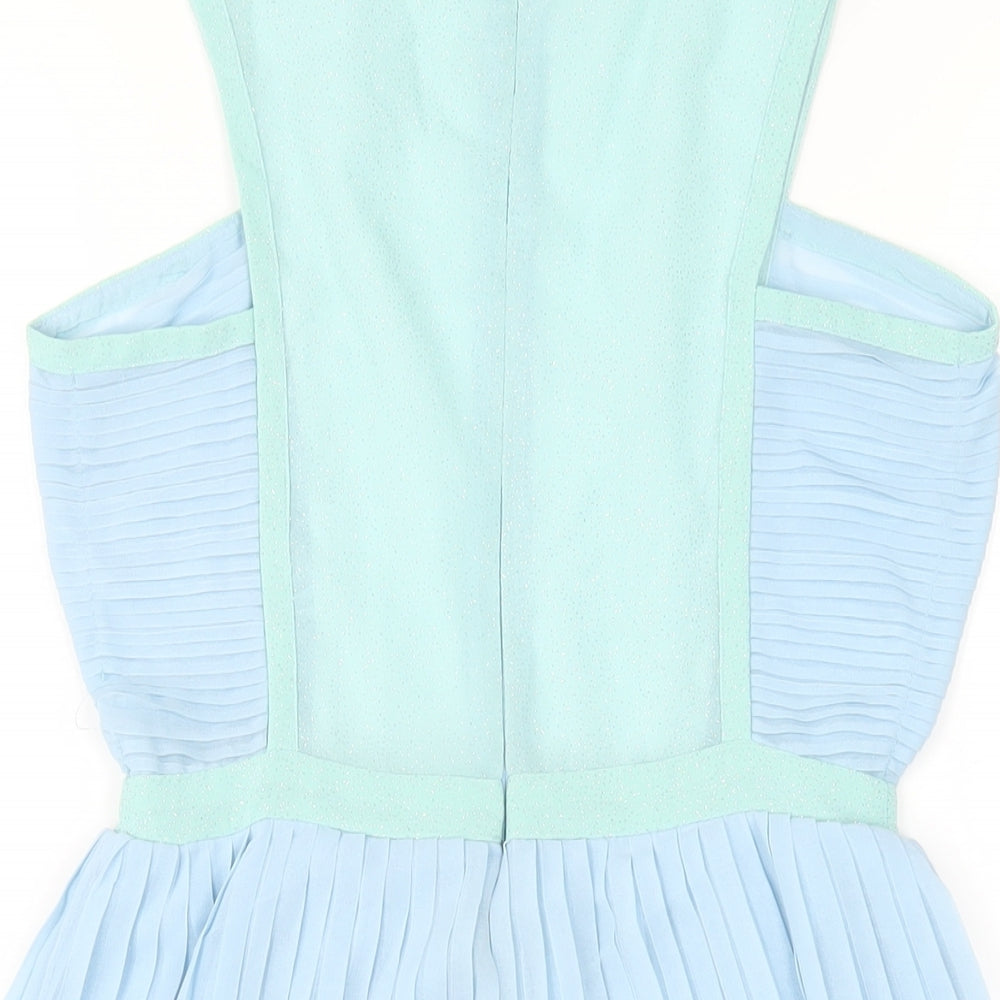 Brand and care label for Missguided women’s blue polyester a-line, size UK 8, round neck zip