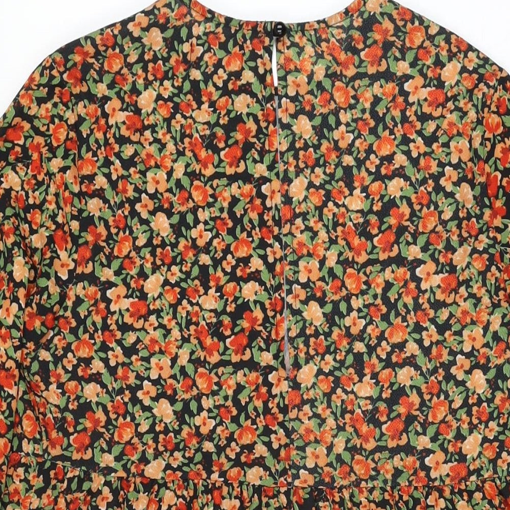 Brand and care label for ASOS women’s black floral polyester shift, size UK 8, round neck button