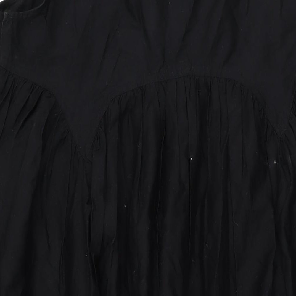 Brand and care label for ASOS women’s black cotton shift, size UK 16, scoop neck pullover