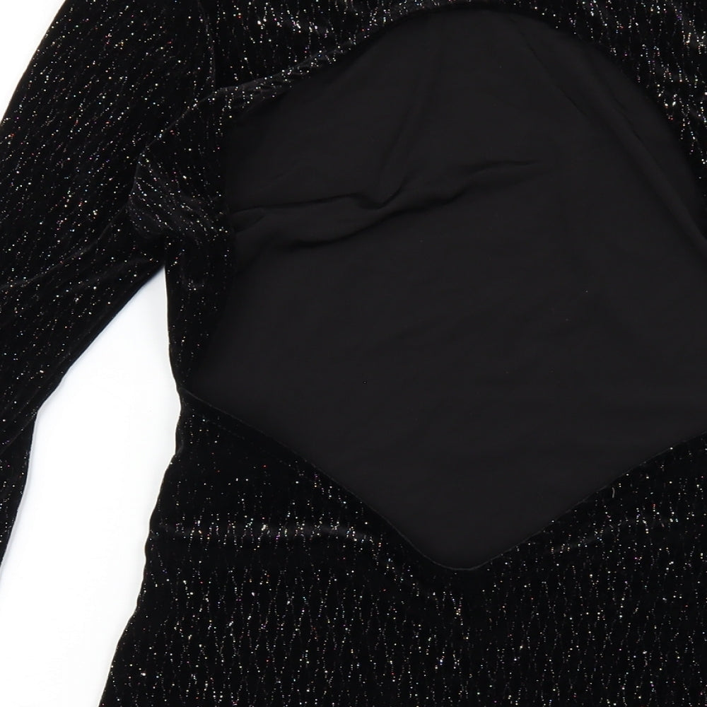 Brand and care label for In the Style women’s black polyester bodycon, size UK 10, round neck pullover