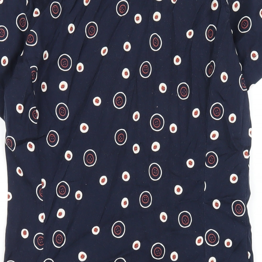 Brand and care label for ESPRIT women’s blue geometric cotton shirt dress, size UK 12, collared button