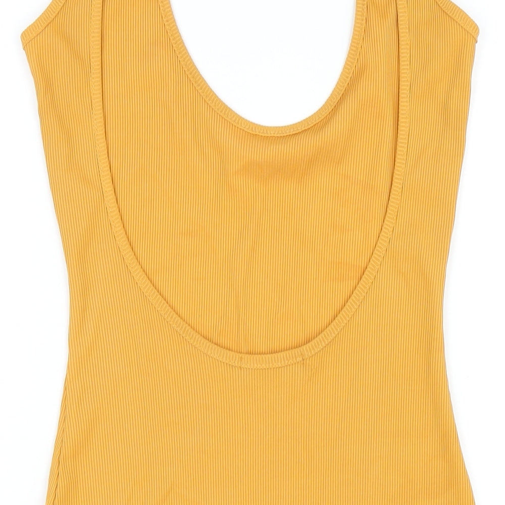 Brand and care label for Missguided women’s yellow polyester bodycon, size UK 8, scoop neck pullover