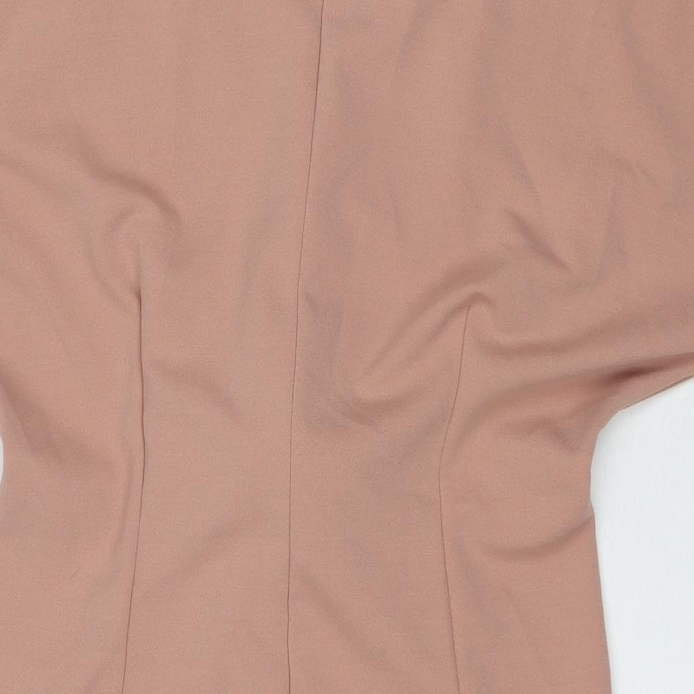 Brand and care label for Missguided women’s beige polyester mini, size UK 8, round neck pullover