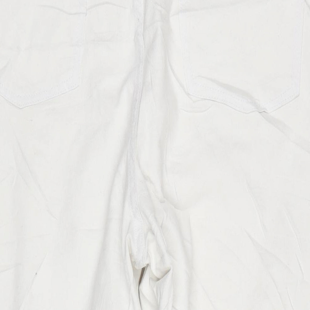 Brand and care label for In the Style women’s white cotton blend straight jeans, size UK 24, 23-inch leg regular zip