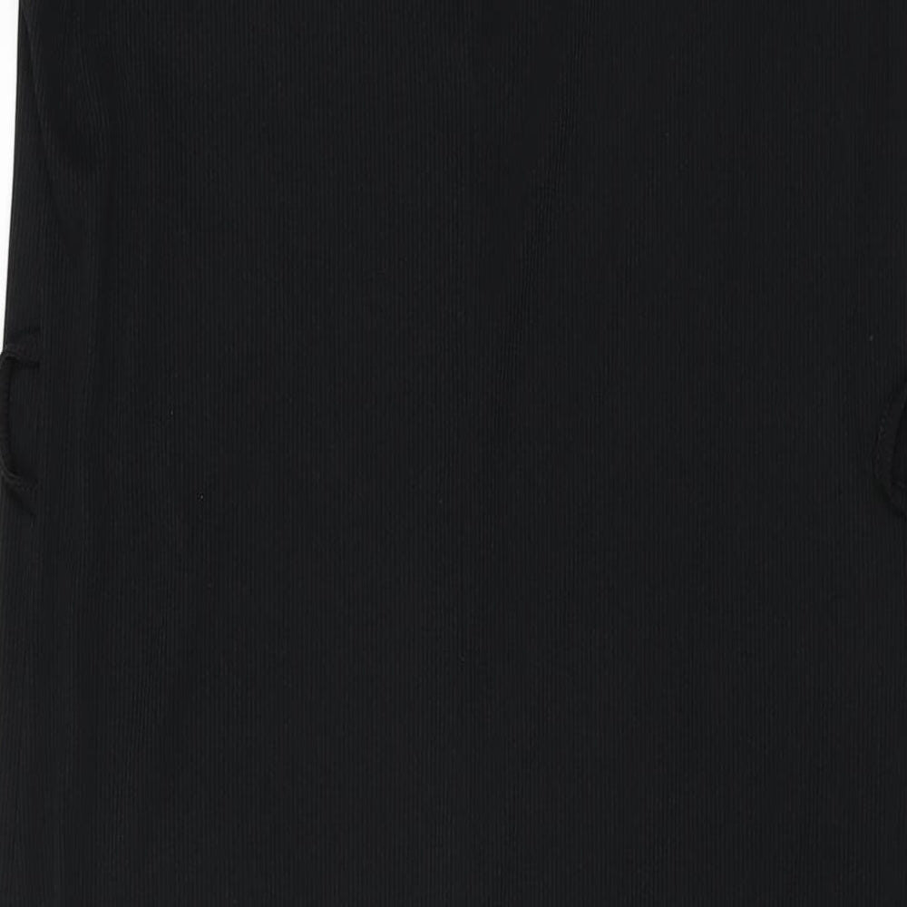 Brand and care label for Missguided women’s black polyester shift, size UK 10, round neck pullover