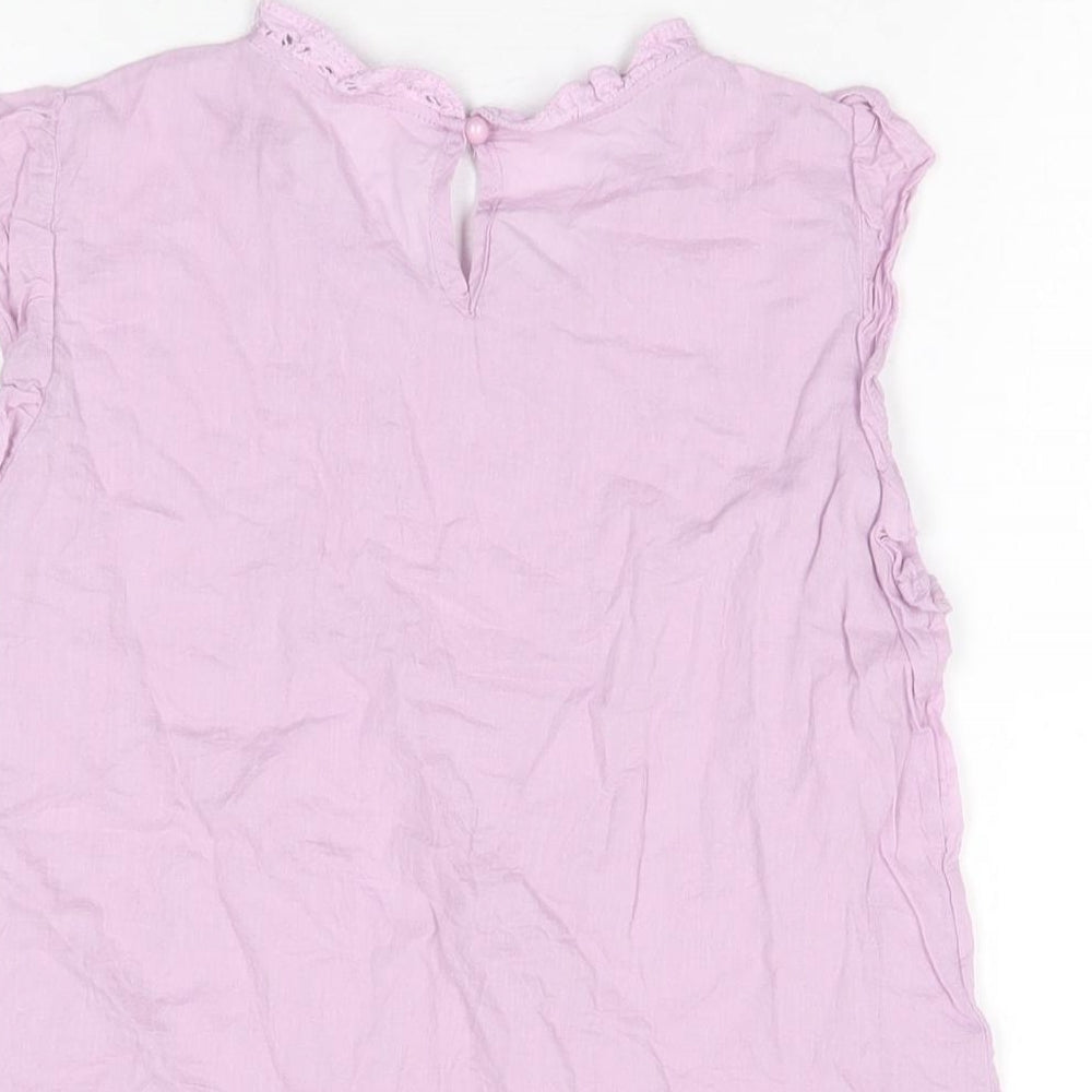 Brand and care label for Loevia girls’ purple floral cotton basic t-shirt, size 14, years round neck button
