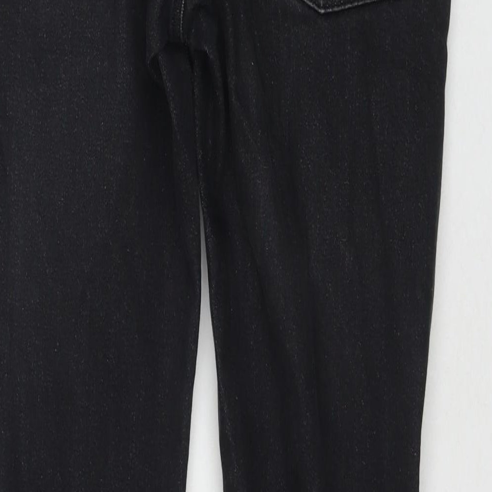 Brand and care label for ASOS men’s black cotton skinny jeans, size 31, in, 30-inch leg regular zip