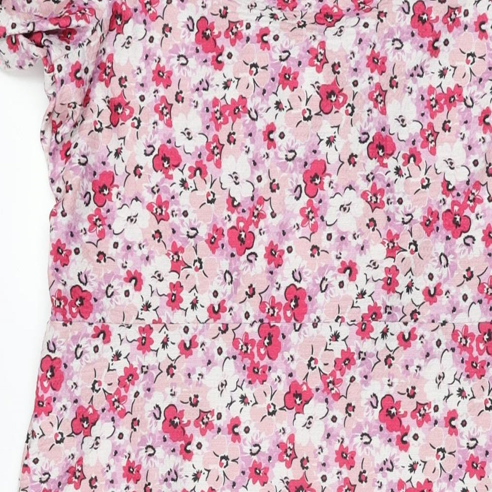 Brand and care label for Miss Selfridge women’s pink floral polyester a-line, size UK 16, sweetheart pullover