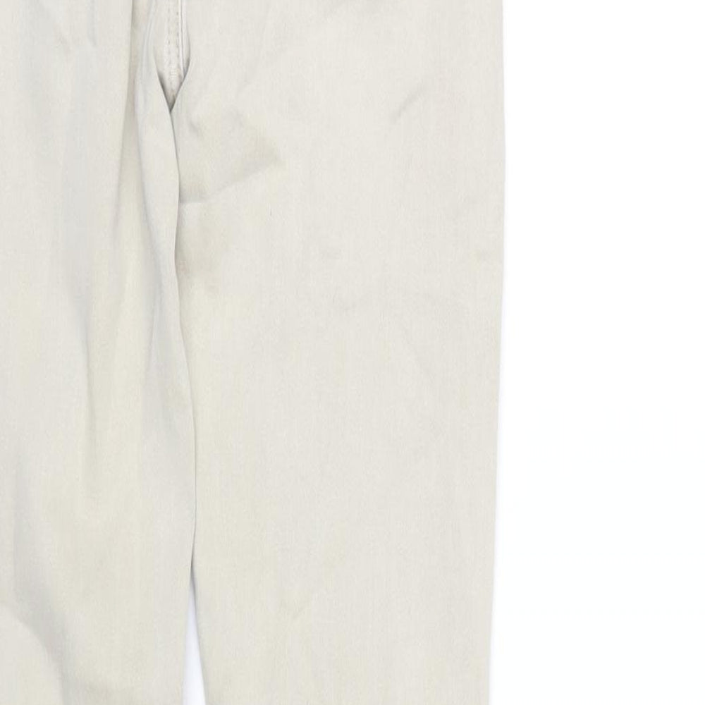 Brand and care label for Toxik3 women’s beige cotton skinny jeans, size UK 10, 30-inch leg regular zip