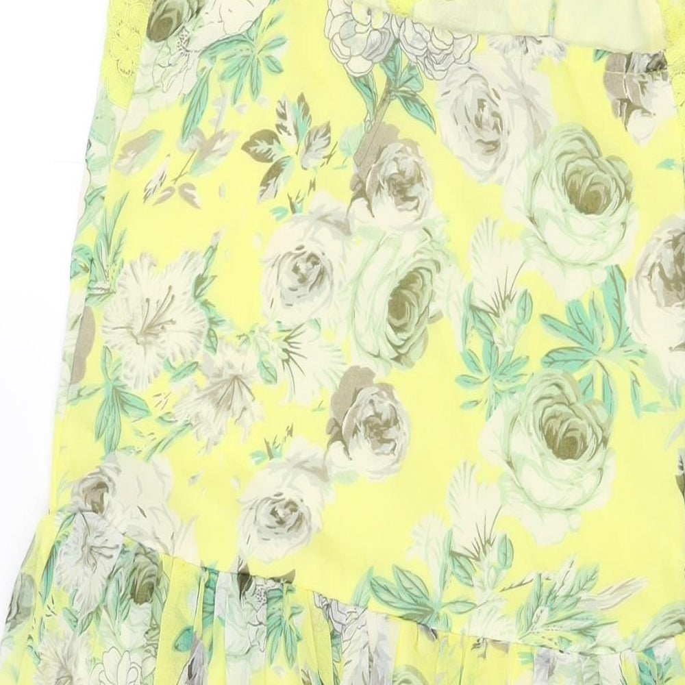 Brand and care label for ASOS women’s yellow floral polyester a-line, size UK 2, v-neck pullover