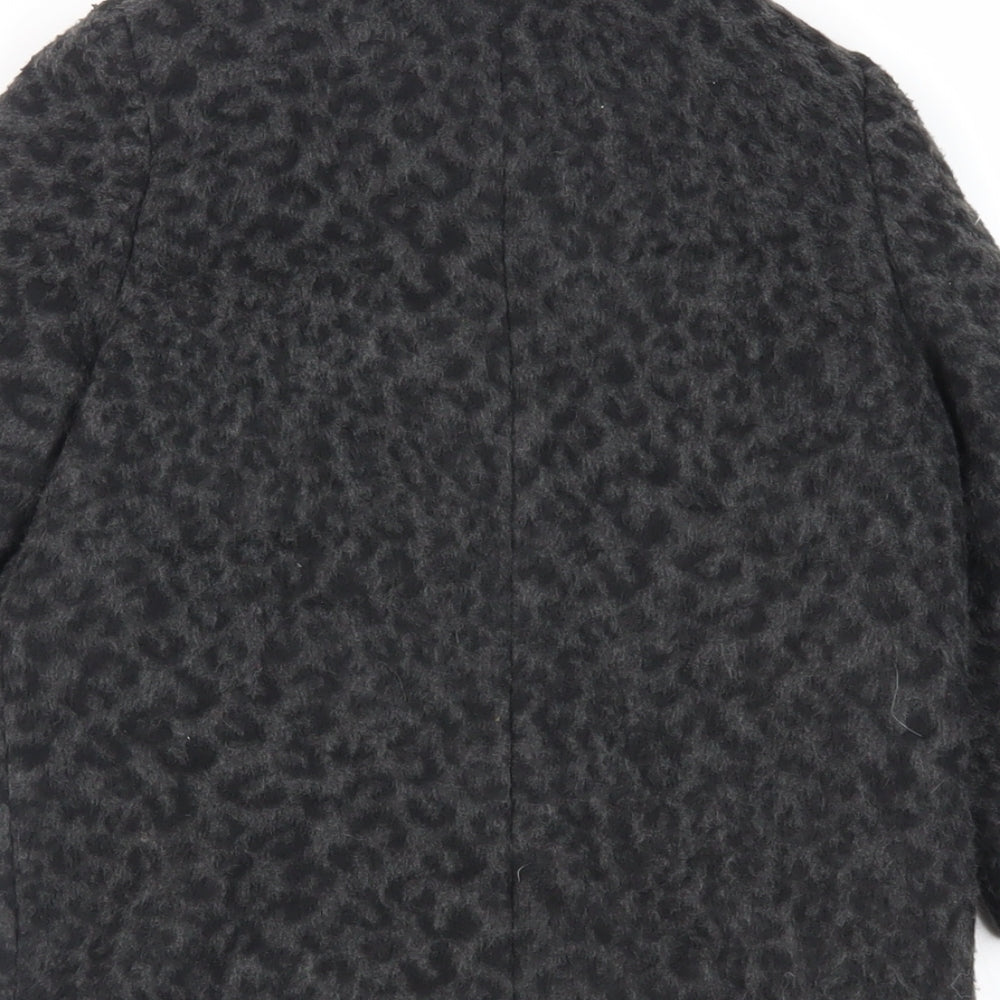 Brand and care label for John Lewis girls’ black animal print pea coat coat, size 4, years button