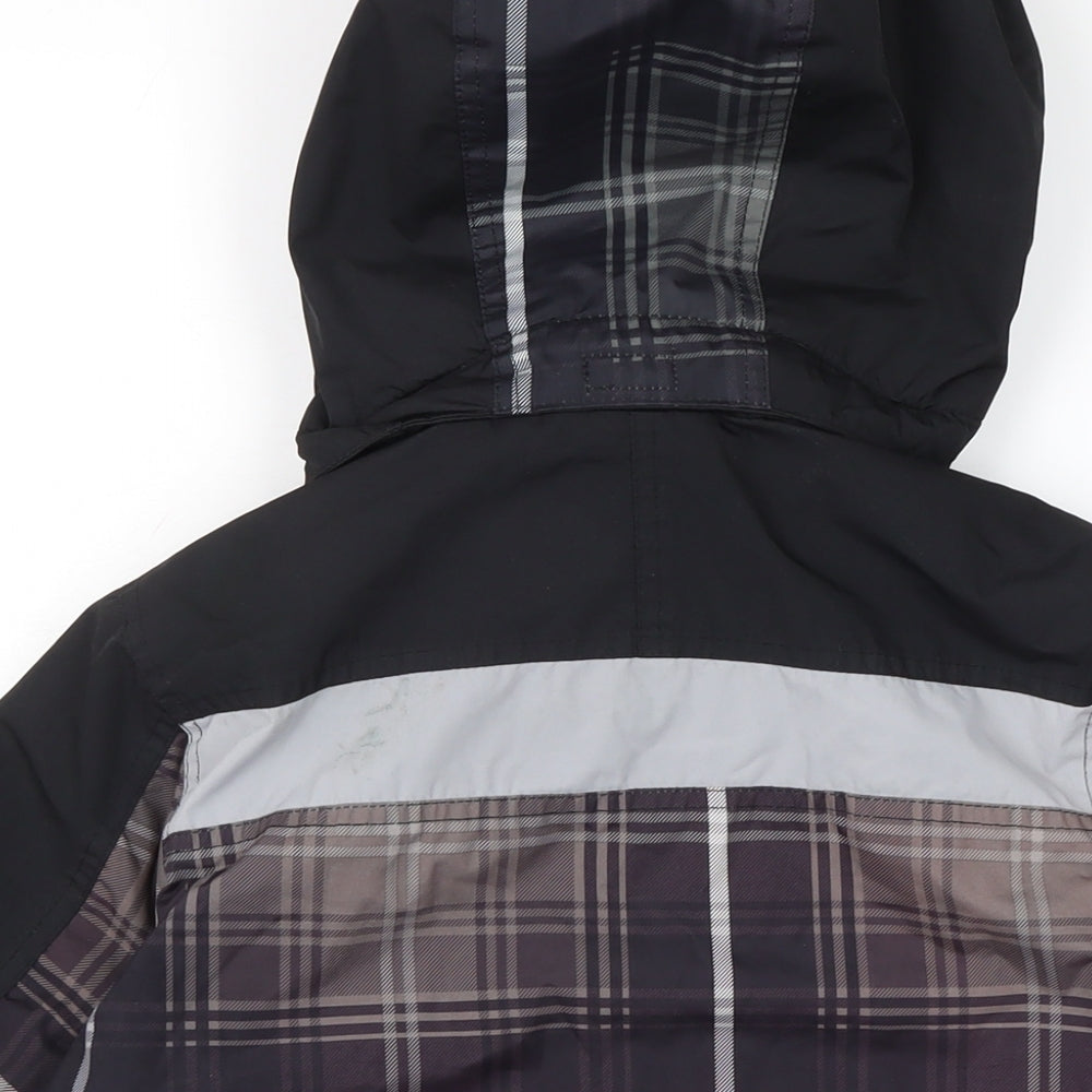 Brand and care label for Free Country boys’ black anorak coat, size S, zip