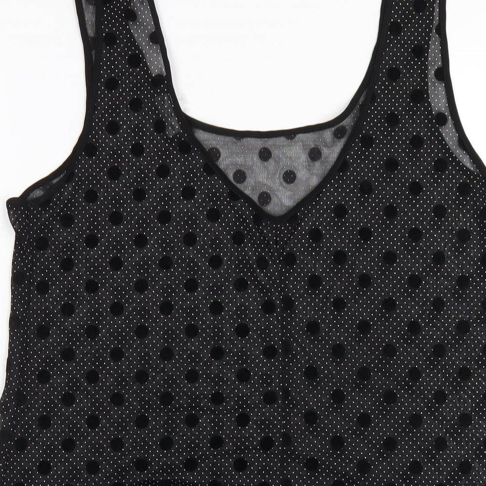 Brand and care label for Miss Selfridge women’s black polka dot polyester basic tank, size UK 12, scoop neck