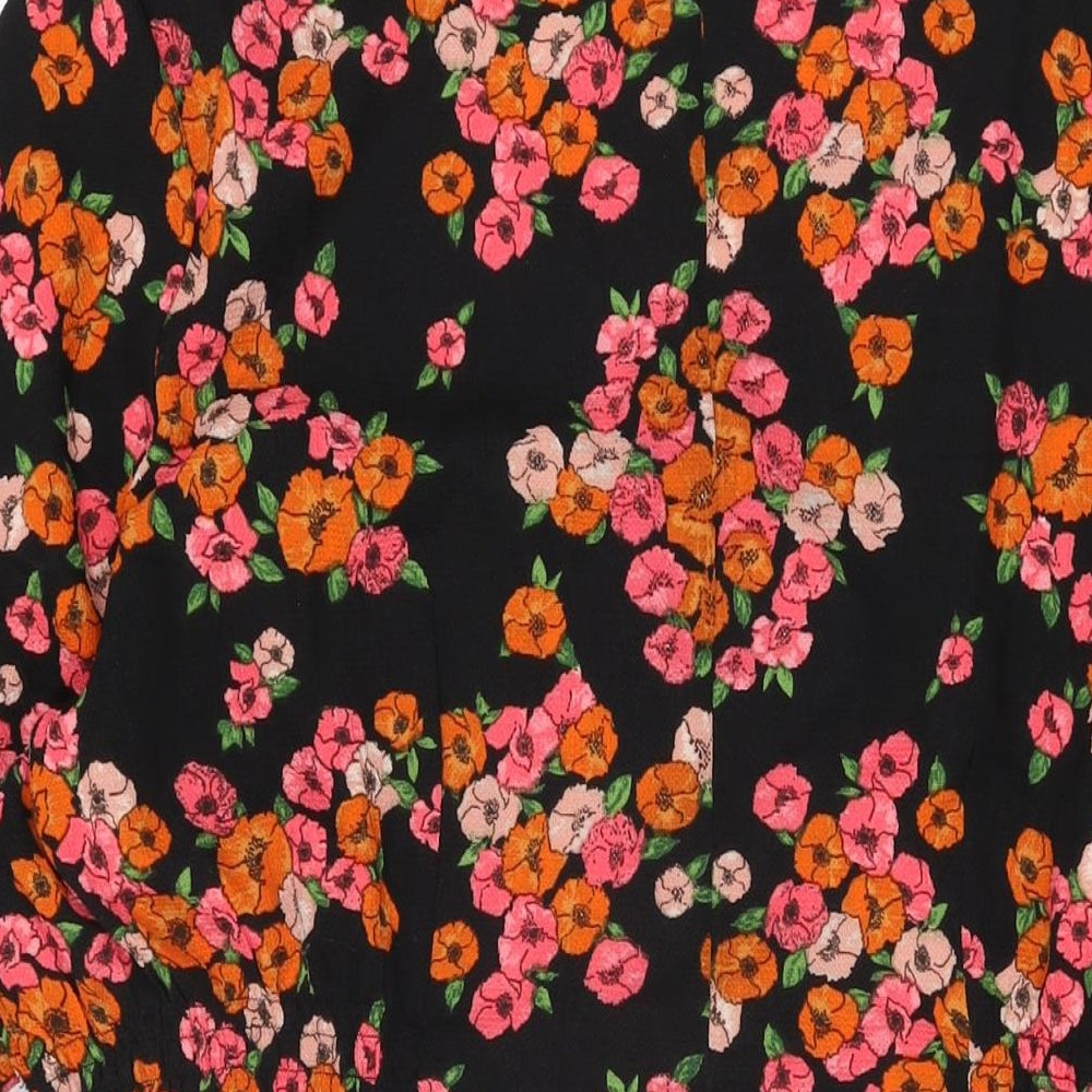 Brand and care label for JD Williams women’s black floral polyester a-line, size UK 20, v-neck pullover