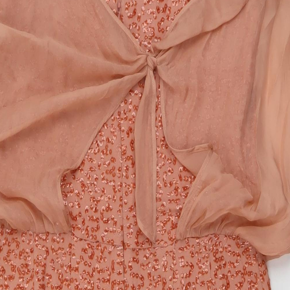 Brand and care label for French Connection women’s orange polyester a-line, size S, round neck zip