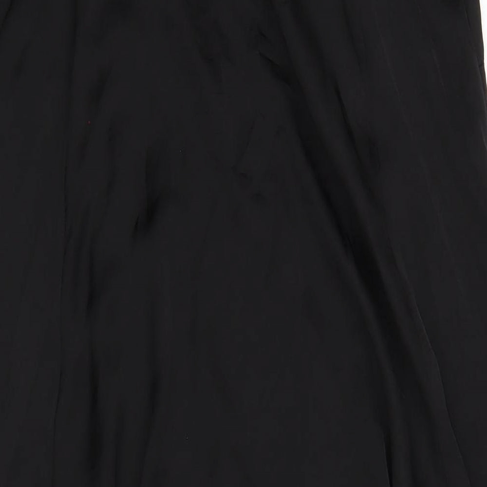Brand and care label for ASOS women’s black polyester a-line, size UK 8, v-neck pullover